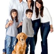 Happy Latinamerican family with a dog - isolated over a white backgrou